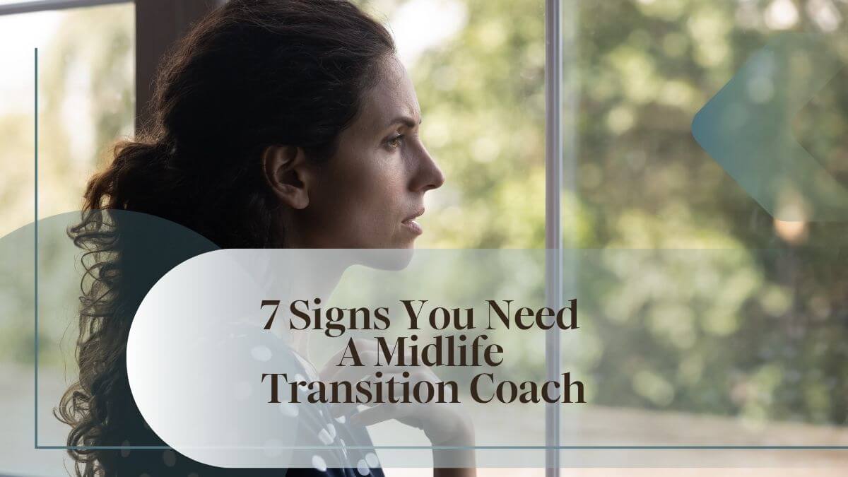 Pensive woman with dark curly hair gazing out a window, with the text "7 Signs You Need a Midlife Transition Coach"